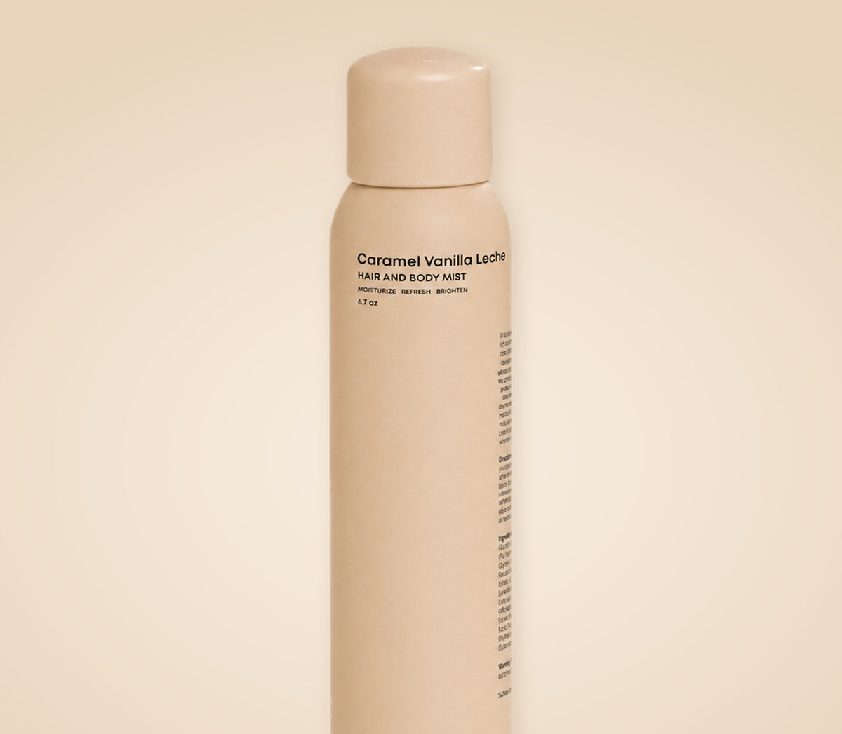 Spice Beauty Caramel Vanilla Leche Hair and Body Mist, 6.7 oz caramel-colored bottle on a warm beige background